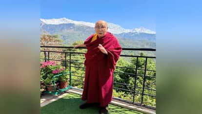 Dharamsala: Tibetan Spiritual Leader the Dalai Lama Gazes upon the Snow Clad Valleys of the Dhauladhar Range.