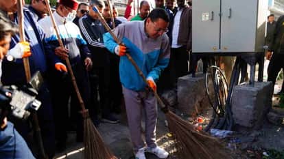 CM Pushkar Singh Dhami participates in a cleanliness drive at Ballupur Chowk in Dehradun