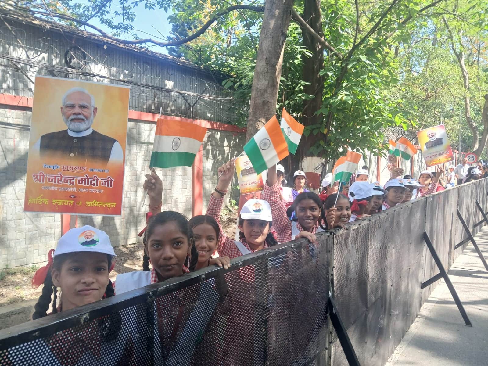 PM Modi Dehradun Visit: Crowds Swarm Streets to Welcome PM Children Arrive Dressed as Modi Photos