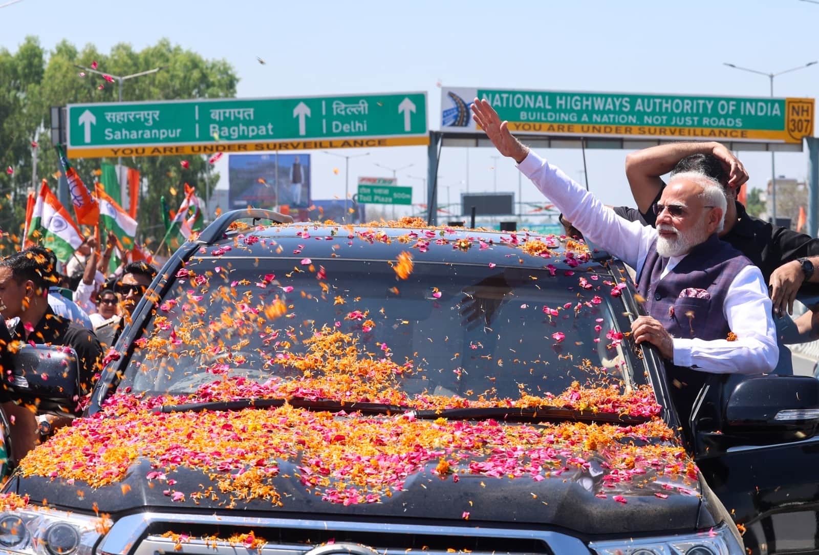 PM Modi Dehradun Visit 12-km roadshow for first time massive crowd turn out Photos