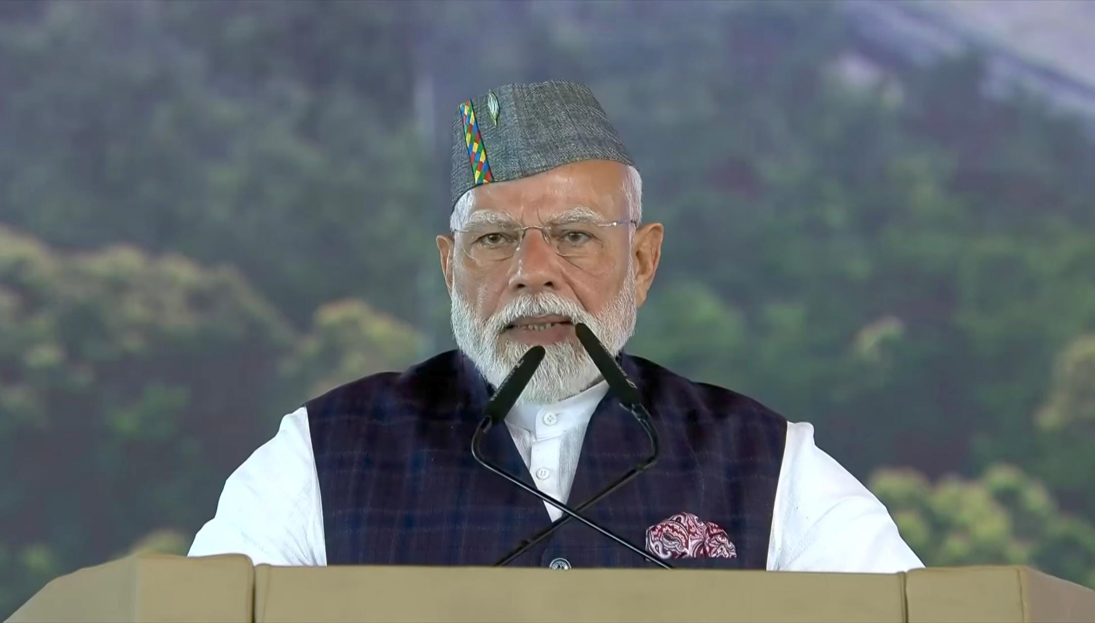 PM Modi Dehradun Visit Sporting a Brahma Kamal Cap and Speaking in Garhwali and Kumaoni PM Won Hearts