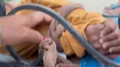 Punjab Police ASI Ties Up Granddaughter to Gate in Sun faridkot Video Viral  Suspended