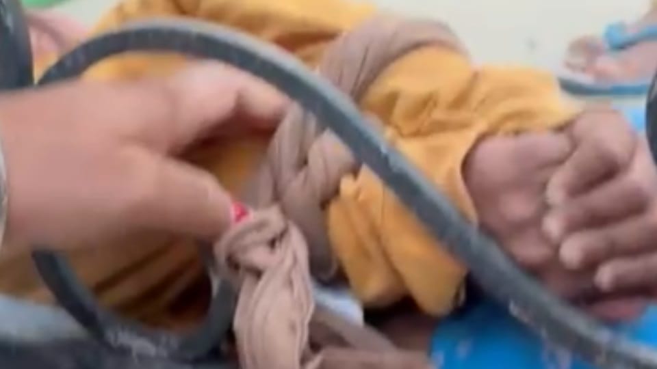 Punjab Police ASI Ties Up Granddaughter to Gate in Sun faridkot Video Viral  Suspended