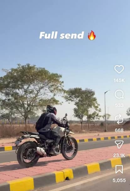 Viral video shows rider performing dangerous stunt on divider with himalayan 450, sparks outrage