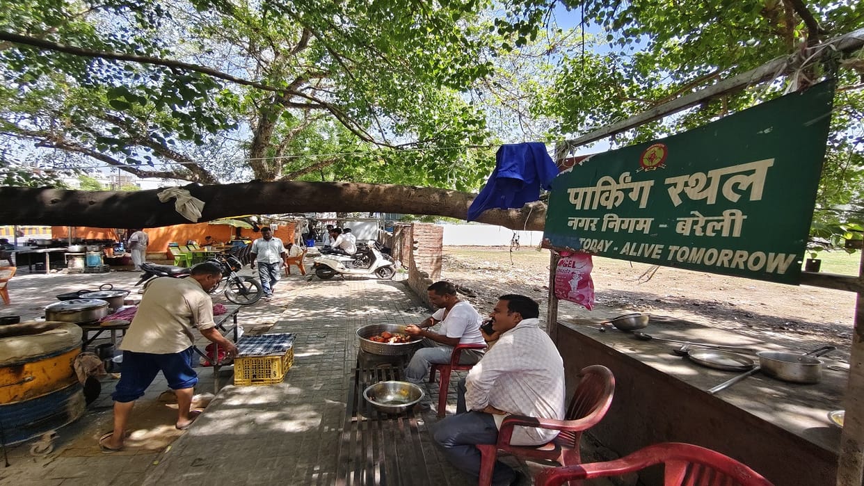 Encroachments on parking spaces and food stalls encroaching upon sidewalks in Bareilly