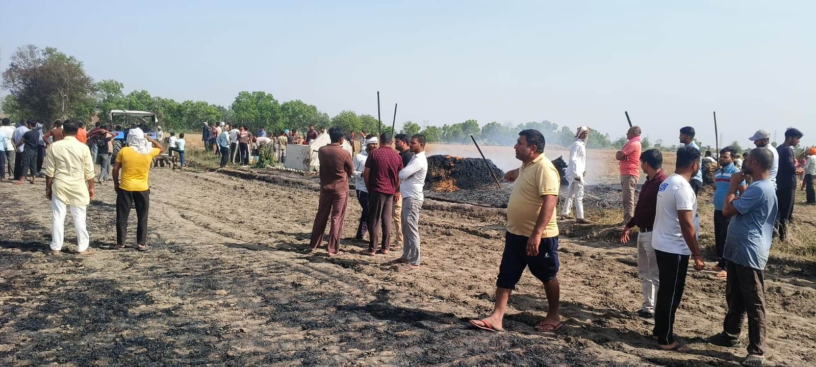 Crops planted across 46 bighas of farmland destroyed by fire in Kapna village Jahangirpur