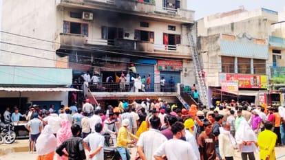 Fire Breaks Out in Building Tenants Rush Rooftop Help Fire Brigade Arrives one Hour Later Out of Water