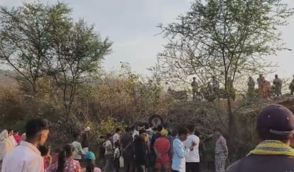 A tractor carrying gravel overturned, killing four youths on the spot after being crushed under the engine