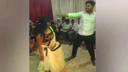 Weapon brandished during Bhojpuri song: At a dance event, a rowdy man brandished a weapon in front of a dancer