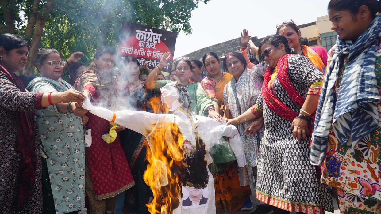 effigies of Rahul Gandhi and Akhilesh Yadav adorned with bangles and set ablaze slogans Murdabad