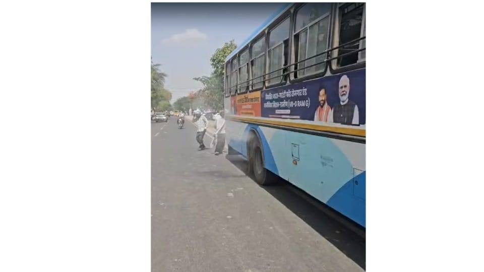 Smoke emanates from a moving Haryana Roadways bus