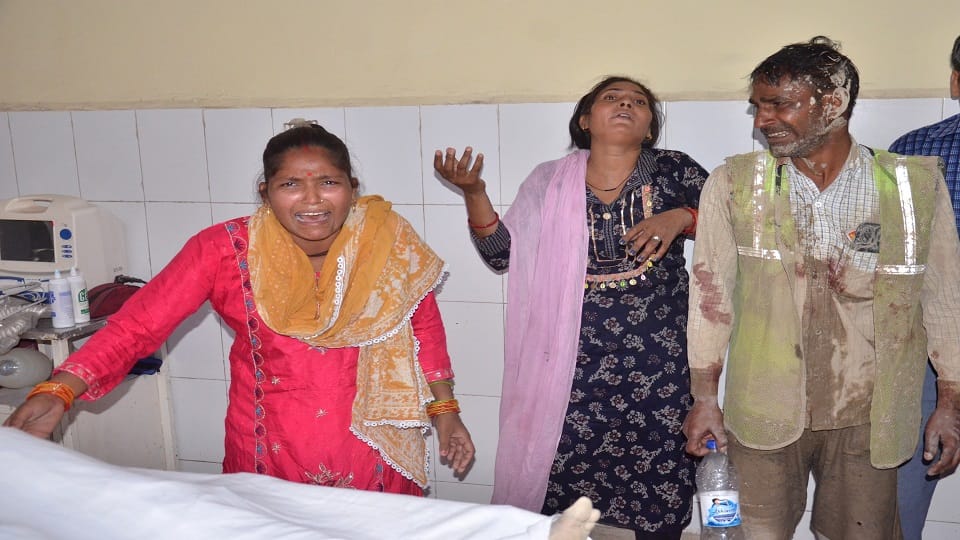Laborer dies after being buried under mud