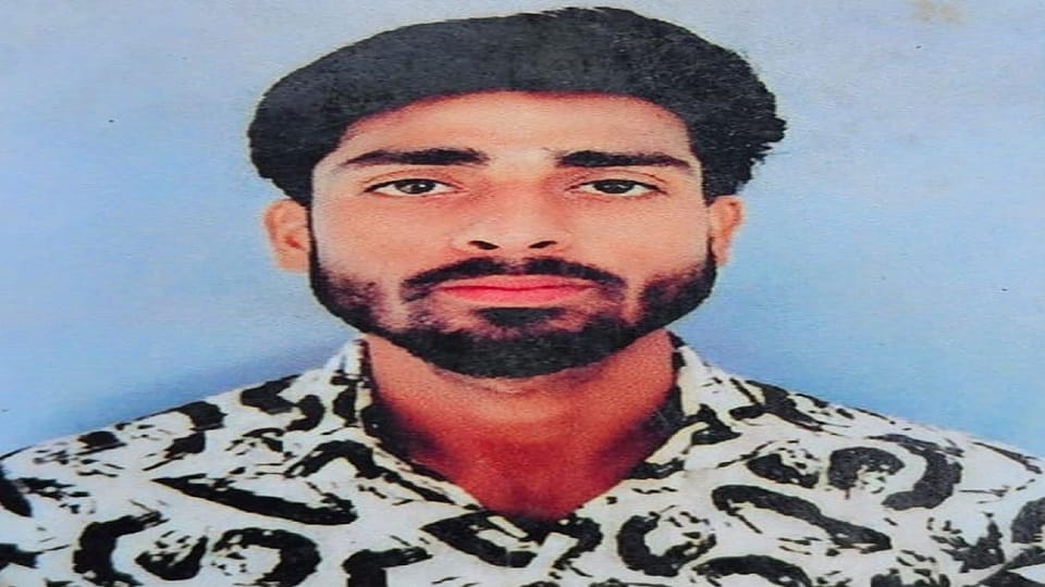 body of a young man found hanging from a tree