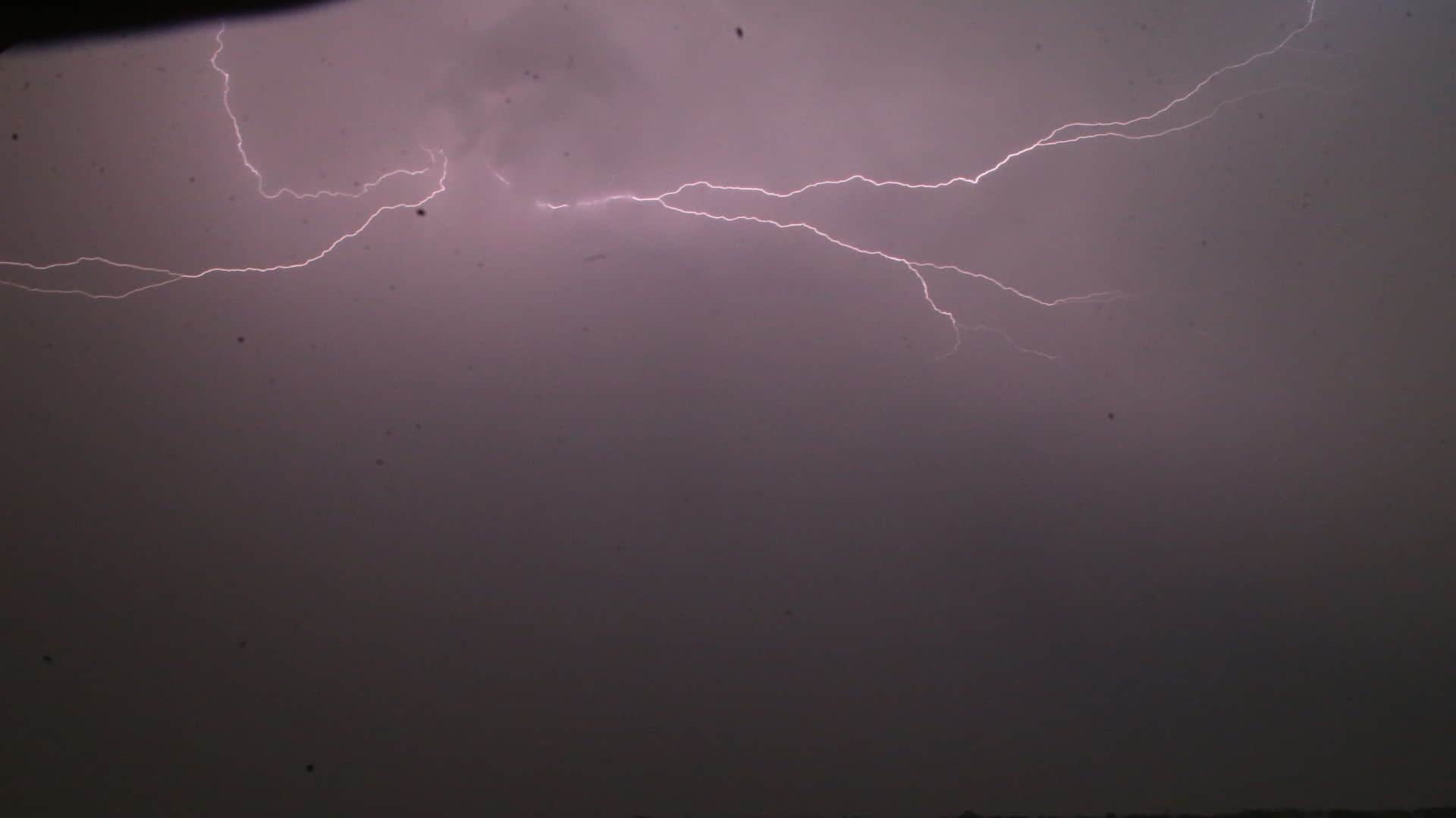 Trees Toppled Varanasi Signboards Blown Away Power Outages Several Areas People Take Shelter Balconies