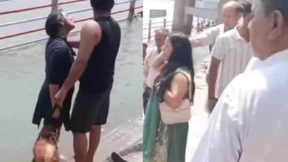 Uproar near Har Ki Pauri Ghat woman bathes a dog in Ganges youths strike at fish with sticks haridwar
