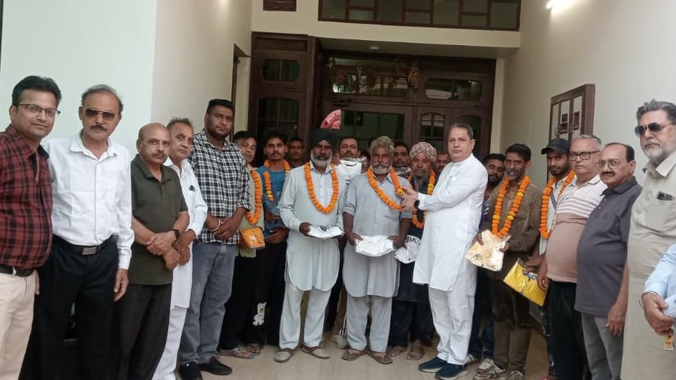 Moga Workers Honored on International Workers' Day Garlands Presented at Grand Ceremony