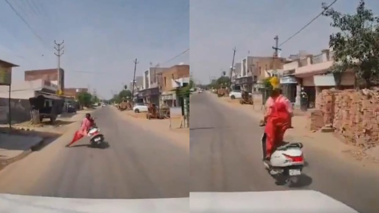 Girl loses her balance due to a speed breaker jumps off her scooter and falls on the roadside.