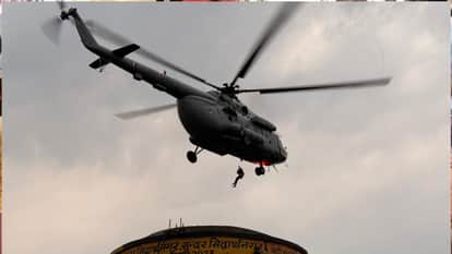 Army helicopter rescues children trapped on a water tank in Siddharthnagar