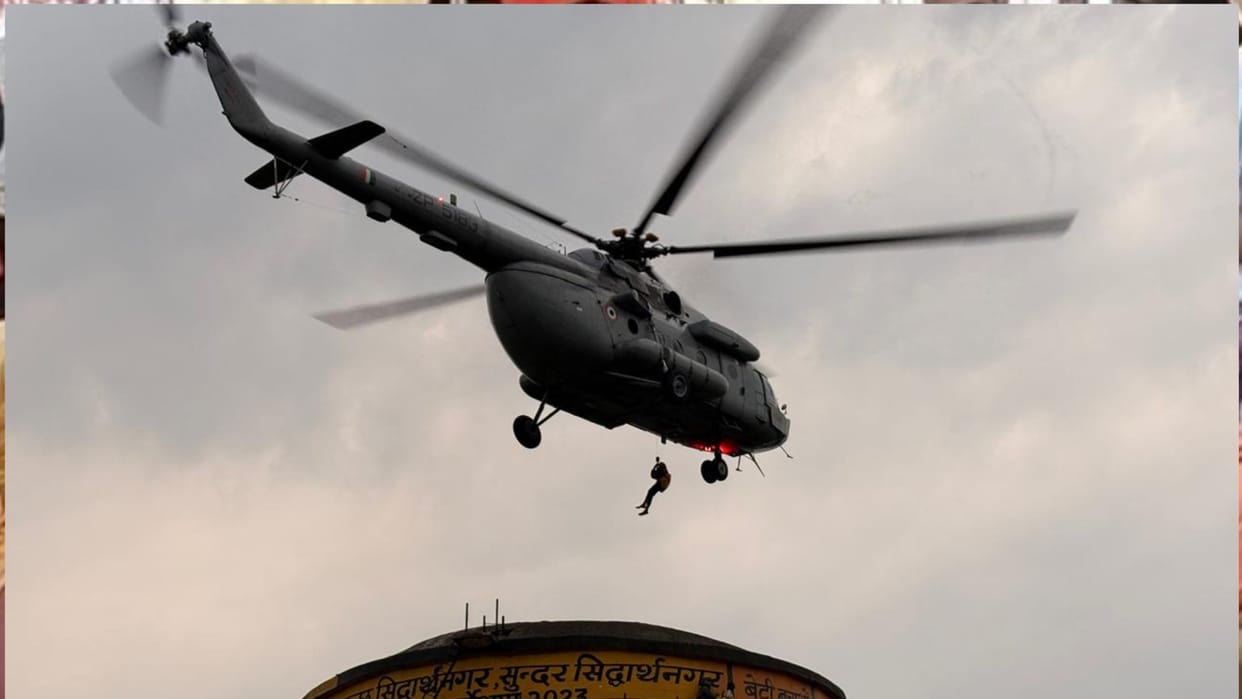 Army helicopter rescues children trapped on a water tank in Siddharthnagar