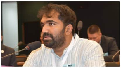 kerala election result Chandy Oommen bicycle campaign rides into history