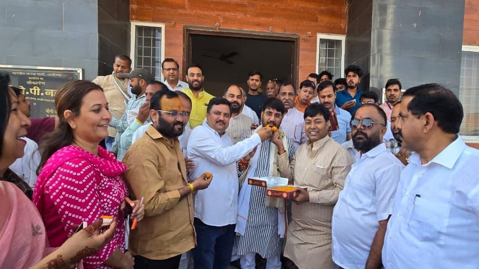 Celebrated BJP victory, distributed Jhalmuri
