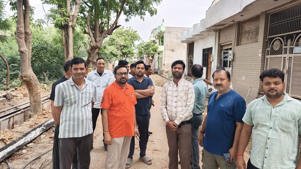Residents Protest Over Poor Civic Facilities Halt Construction Work in Colony