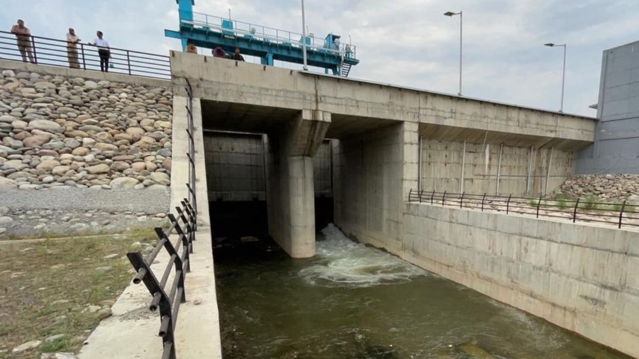 Water of Ravi Daria was released from Shahpur Kandi Bairaj to Ujj Bairaj for the first time on Tuesday.