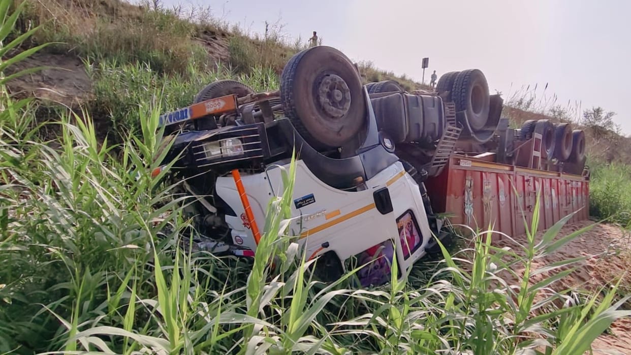 Sand-Laden Trailer Crashes 15 Feet Down After Breaking Through Railing Due to Driver Dozing Off in mau