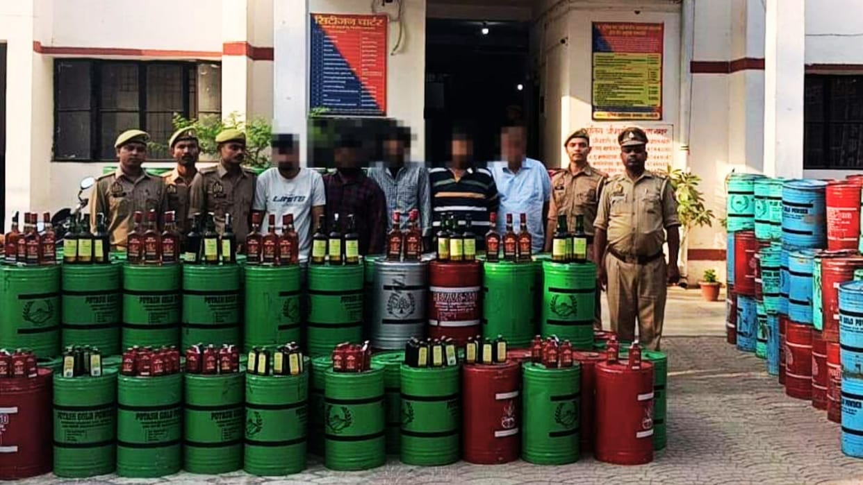 Liquor Smuggled Tin Containers Labeled Potash Five Arrested Goods Worth 22 Lakh Recovered Wood Sawdust