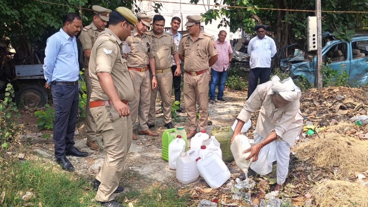 Azamgarh police 250 liters of seized illicit liquor destroyed on court order