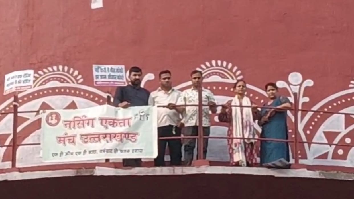 Nursing Unity Forum Members demonstrated and climbed onto a water tank Dehradun News