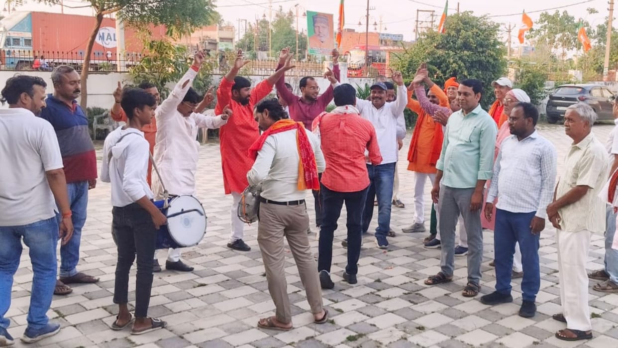 Politics BJP Members Express Joy Distribute Sweets Over Hansraj Vishwakarma Appointment Minister of State