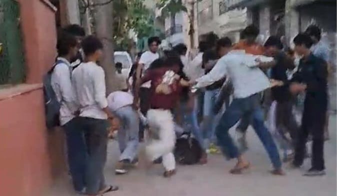 Two Youths Clash Over Woman in Middle of Road in Faridabad