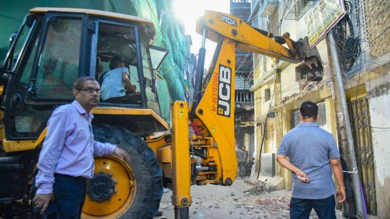 bjp government bulldozer action kolkata illegal construction tmc corruption charges suvendu adhikari news