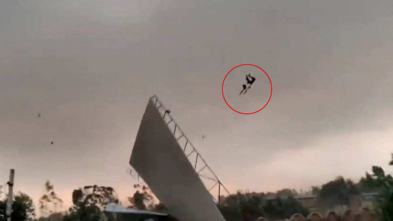 bareilly viral video man flying with tin shed in storm