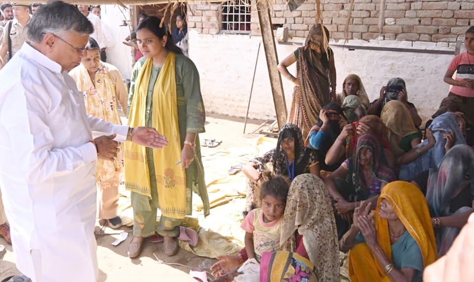 The Minister in charge handed over cheques to the families of those who lost their lives during the storm.