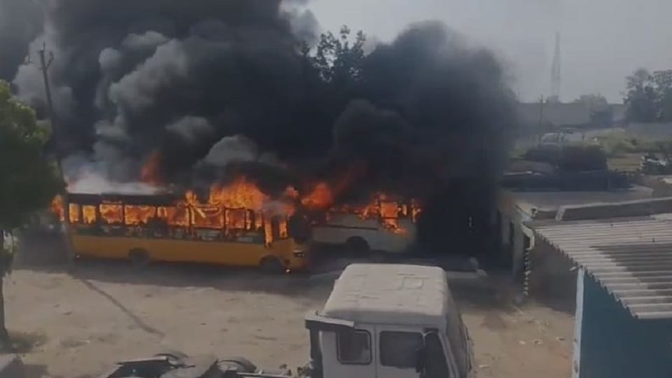 Three school buses and one private bus caught fire