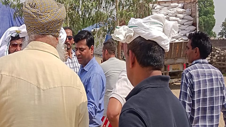 Water was being poured on wheat stock at the rice mill to increase its weight