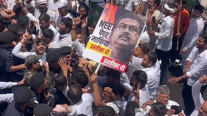 neet paper leak jaipur congress protest bjp headquarters gherao water cannon dharmendra pradhan resignation