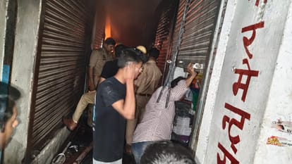 Kanpur Fire Massive Blaze Engulfs Four Story Building Firefighters Jump from Roof to Safety