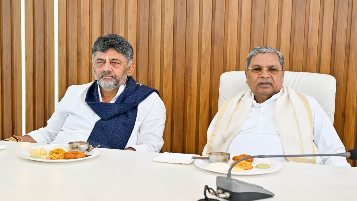 DK Shivakumar bows at CM Siddaramaiah's feet, emotional moments before leadership change