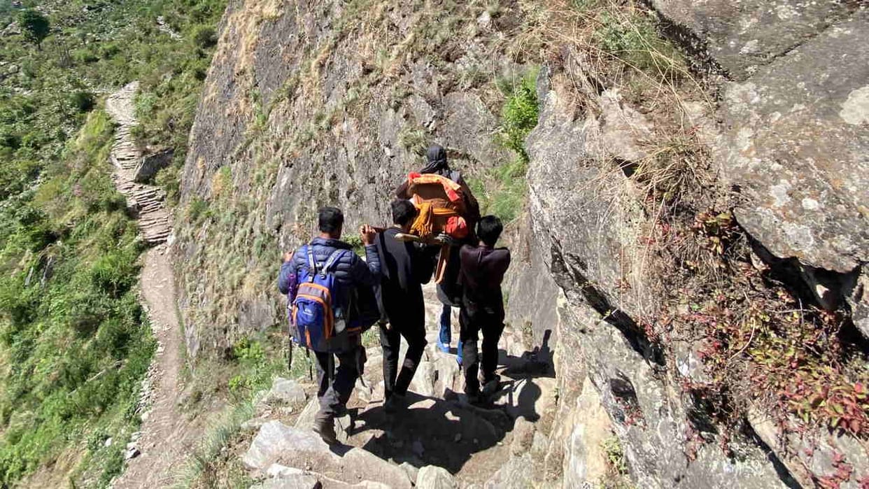 Sick woman carried 11 KM on a makeshift stretcher to reach road Seva village Uttarkashi Himachal Pradesh