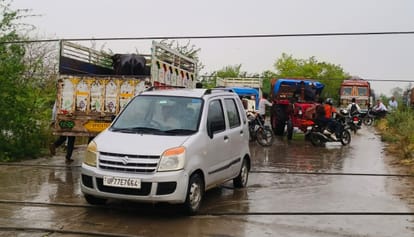 Orai Storm Wreaks Havoc High Tension Pole Topples onto Road Motorists Stranded for Hours Amid Traffic Jam