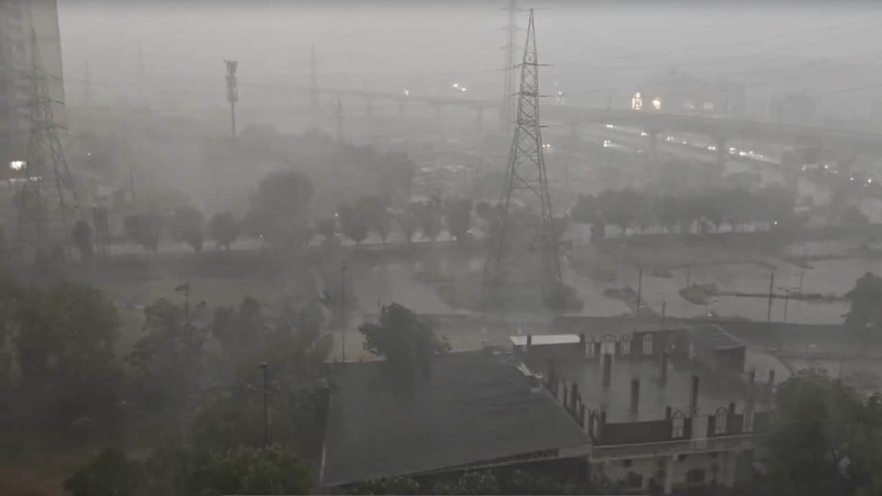 Delhi-NCR torrential rain in pictures 80-100 km/h winds Daytime darkness