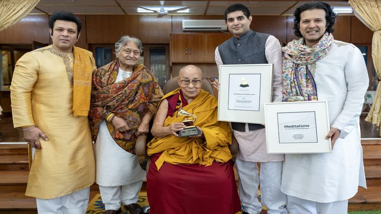 dalai lama receives first grammy award at dharamshala residence
