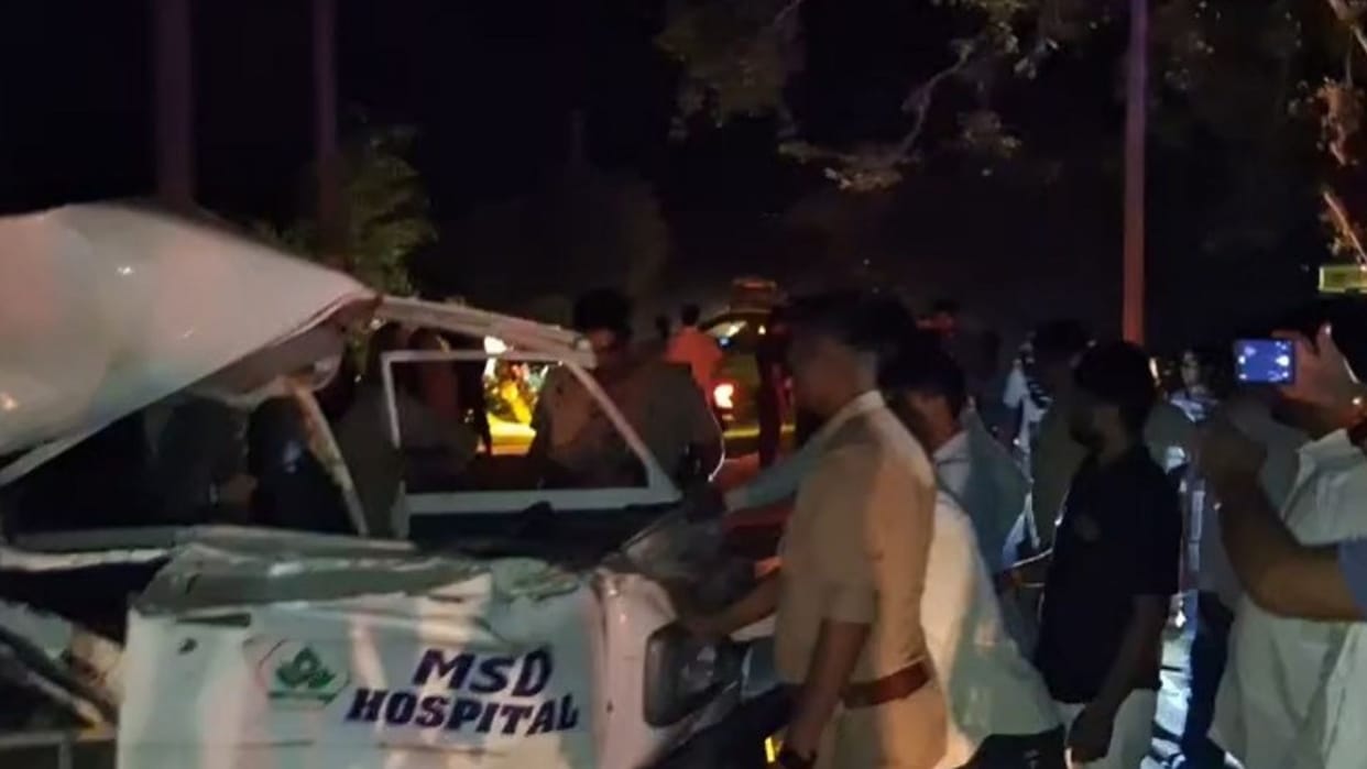 Tractor-trolley crashes into house after hitting an ambulance patient driver killed one injured blocked
