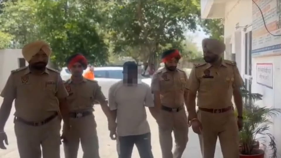 Drug smuggler arrested with illegal weapon