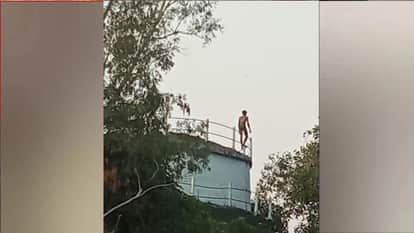 In Gorakhpur, a son climbed a tower after being scolded by his father; police brought him down after an hour.