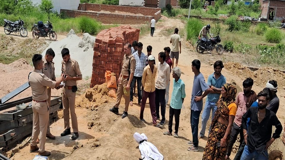A dumper dumped soil on a worker sleeping in a house