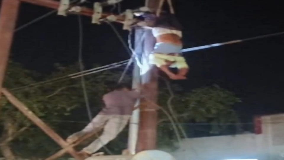 Lineman left hanging upside down from electric pole after sudden electric shock